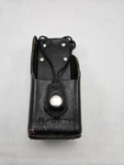 Used Motorola Leather Radio Carry Case Pouch NTN8038B. Fixed Price $16.87.