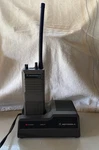 Vintage Motorola HT600 Portable Two-way Radio & Charging Station. Fixed Price $40.00.