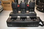 Complete Icom Two-way Radio System: 6 IC-F4S-4 Handhelds + BC-121N Multi Charger. Fixed Price $350.00.